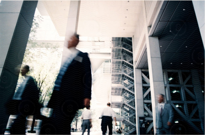 People crossing a lobby in a modern building