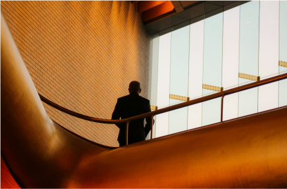 A person on a curved staircase